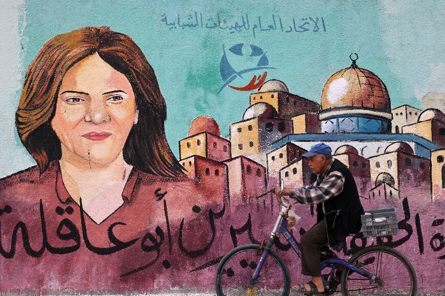 A mural pays tribute to slain Al Jazeera journalist Shireen Abu Akleh in Gaza City