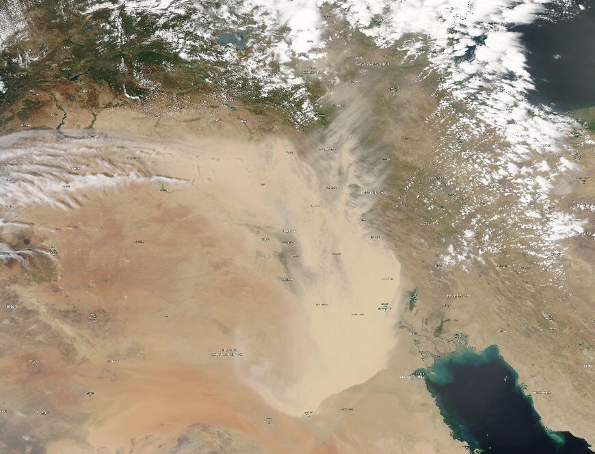 A satellite image courtesy of NASA Earth Observatory taken on May 16 shows a dust storm engulfing parts of Iraq and neighbouring countries