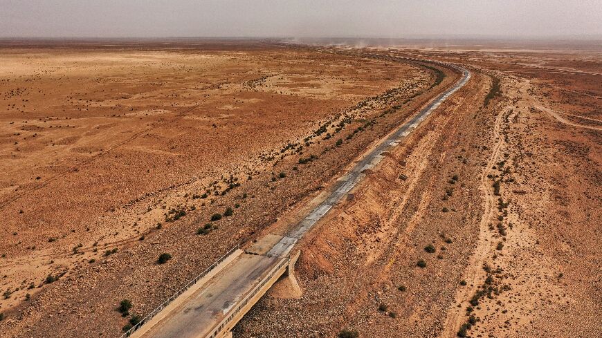 Motorists no longer need the asphalted road that used to bridge Lake Hamrin, they can simply drive across the dried out lakebed