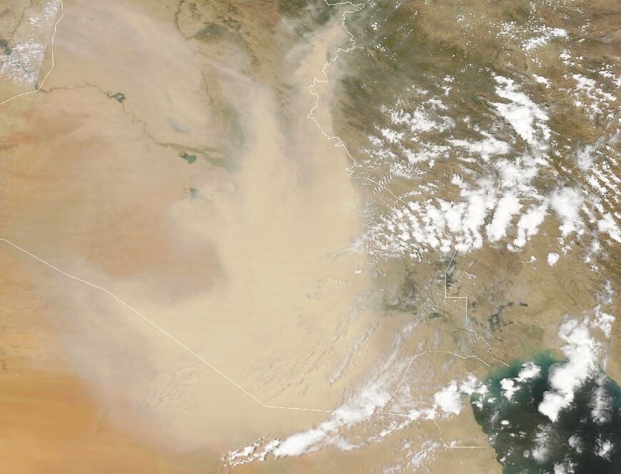 A satellite image provided by NASA Earth Observatory taken on May 5, 2022, shows a dust storm engulfing parts of Iraq and neighbouring countries
