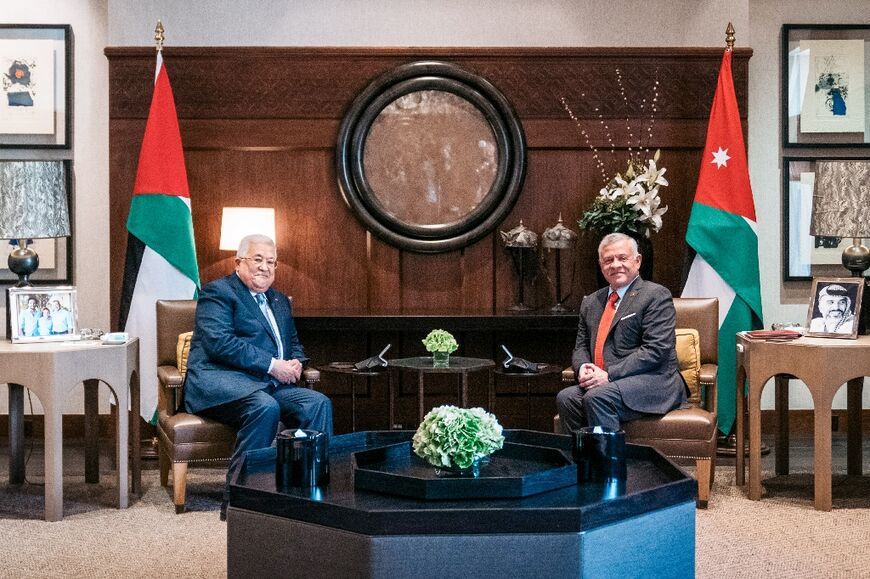Jordan's King Abdullah II (R) receives Palestinian president Mahmud Abbas (L), at Al-Husseiniya Palace in the capital Amman