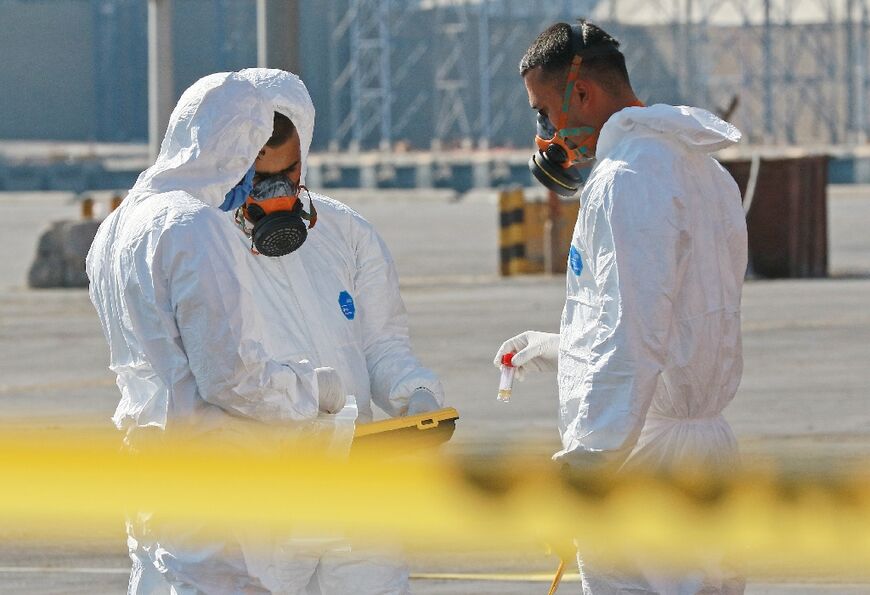 Emergency services were at the site on Tuesday dressed in hazmat suits