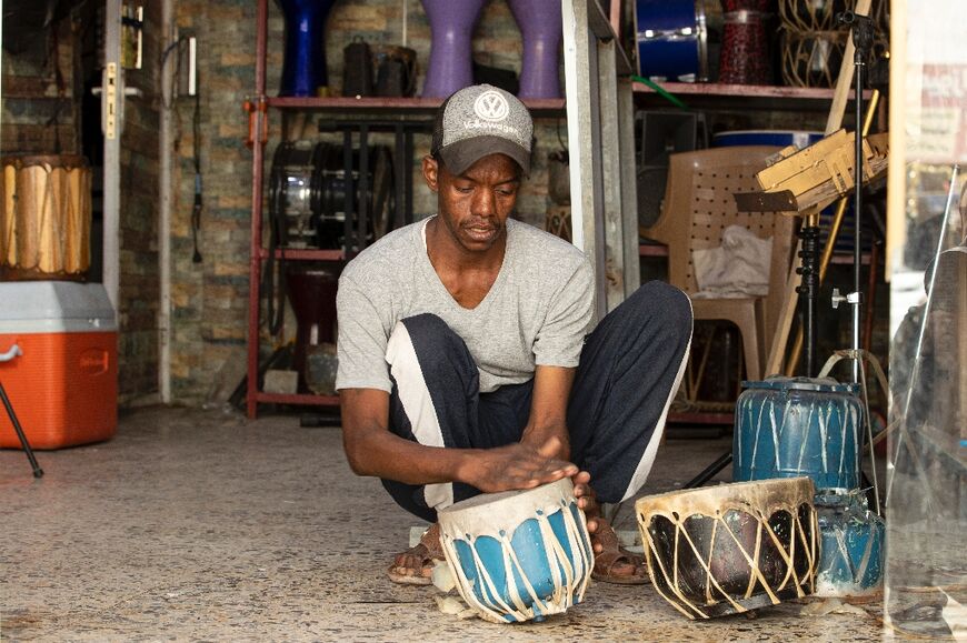 Khaled al-Dawsary, a maker of traditional drums such as the daf and tabla, at his workshop in the southern city of Zubair 