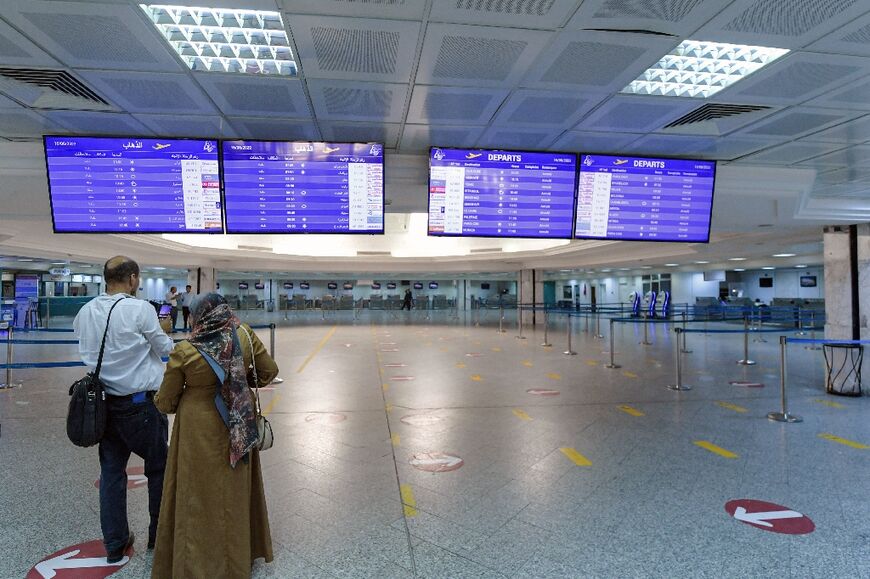 Check-in counters at Tunisia's Tunis-Carthage airport stand empty as a strike by the country's powerful UGTT trade union confederation forces the cancellation of all flights