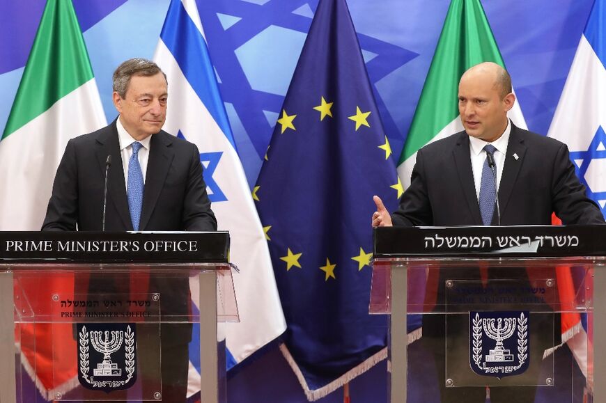 Italian Prime Minister Mario Draghi and his Israeli counterpart Naftali Bennett address reporters after Jerusalem talks on boosting Israeli gas deliveries to Europe