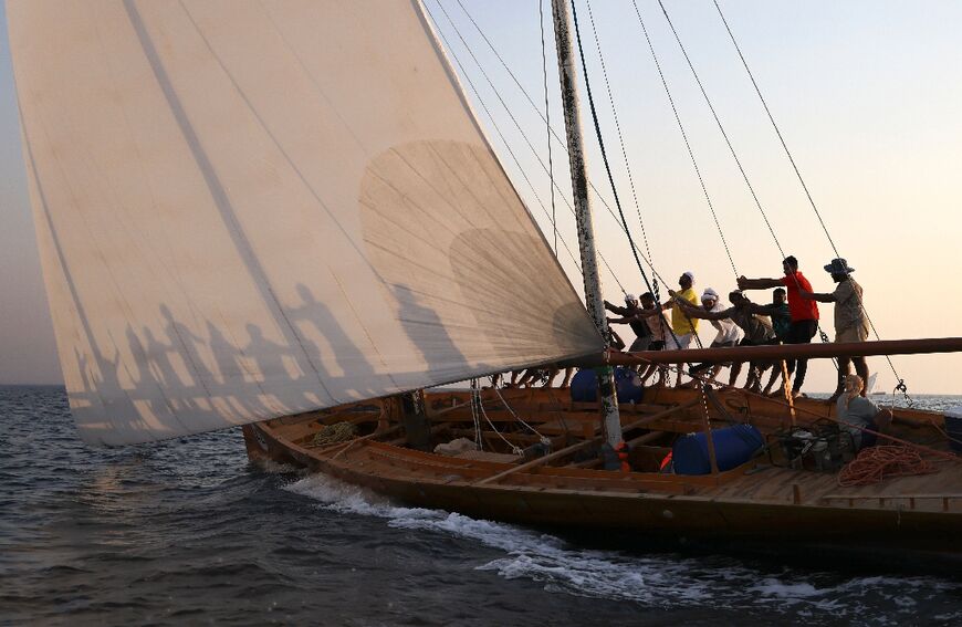 Hoisting the sail is a precarious exercise