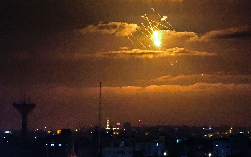 Israel's Iron Dome defence system intercepts incoming missiles fired from the Gaza Strip above the Palestinian enclave, on April 21, 2022. The Iron Dome costs roughly $50,000 per launch
