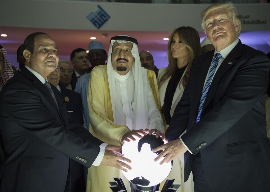 US President Donald Trump (R), Egyptian President Abdel Fattah el-Sisi (L) and Saudi Arabia's King Salman bin Abdulaziz al-Saud pose at the opening of a Riyadh-based centre to combat extremist ideology in May 2017