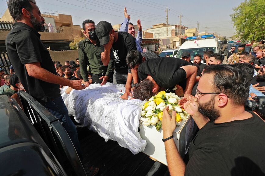 Mourners grieve for Abbas Alaa, a 24-year-old engineer who was on his honeymoon when he was killed in the shelling