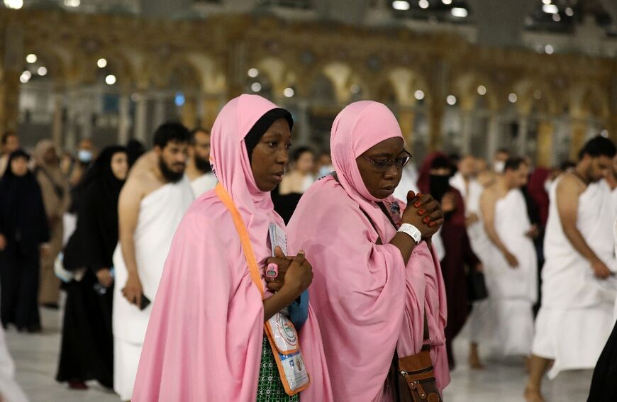 This year's hajj has taken on a different hue with thousands of unaccompanied women joining the rituals: many have abandoned the black robes traditionally preferred with reds, greens, oranges and blues dotted around the crowds