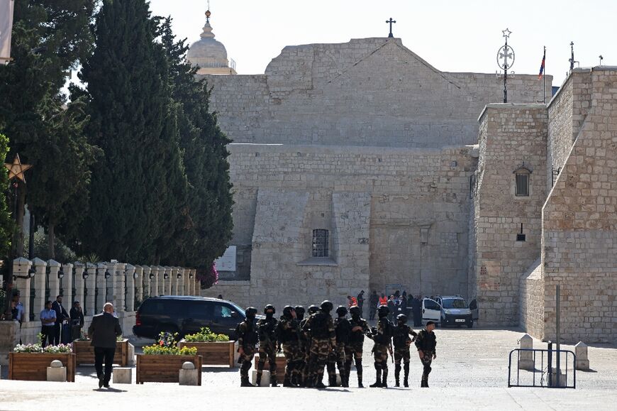 Palestinian security officers deploy near the Church of the Nativity in Bethlehem in the occupied West Bank, on July 14, 2022, ahead of US President Joe Biden's arrival