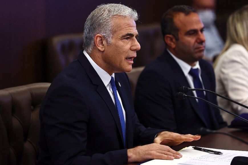 Israeli Prime Minister Yair Lapid addresses a cabinet meeting at his office in Jerusalem on Sunday
