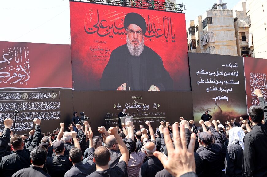 Hezbollah leader Hassan Nasrallah addresses followers in Beirut via a giant screen during an event to mark Ashura, a 10-day mourning period commemorating the seventh century killing of Prophet Mohammed's grandson Imam Hussein