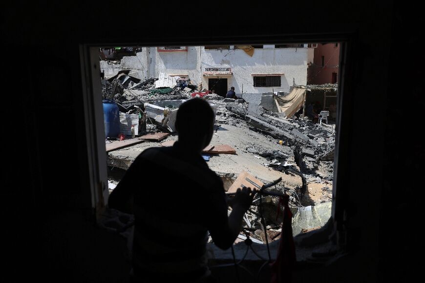 A gaping hole is all that remains of the Shamalagh family home in Gaza City after it was blown up in an Israeli strike