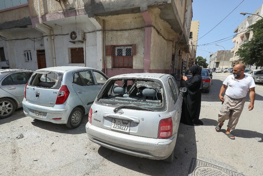 Flights resumed and shops re-opened in Libya's capital after the clashes between backers of rival governments