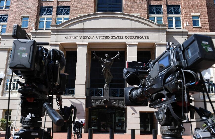 Members of the media await the sentencing of El Shafee Elsheikh outside the Albert V. Bryan Federal Courthouse in Alexandria, Virginia on August 19, 2022
