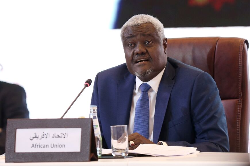 African Union (AU) Commission Chairperson Moussa Faki Mahamat attended the signing ceremony in Doha