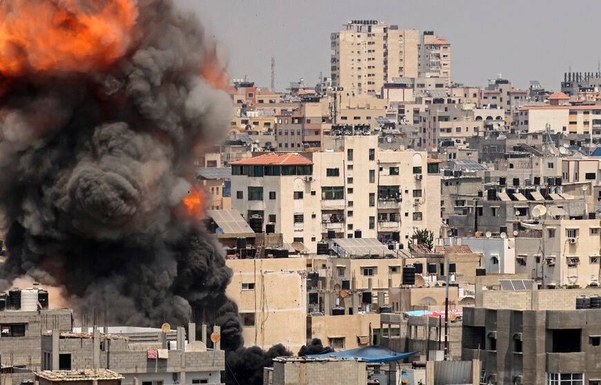 Smoke billows from an Israeli air strike in Gaza City on Saturday