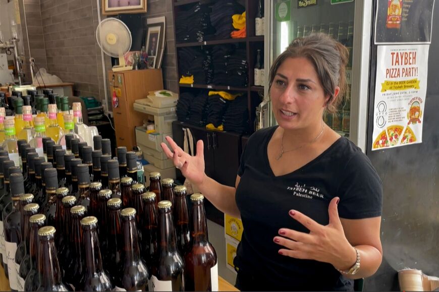 Madees Khoury, 36, 
the woman who runs the Palestinian beer brewery of Taybeh in the West Bank