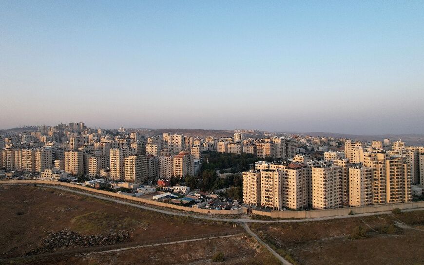 A section of Israel's controversial separation wall, erected by the Jewish state in 2002 to protect it from attacks, surrounding the Kufr Aqab suburb of east Jerusalem