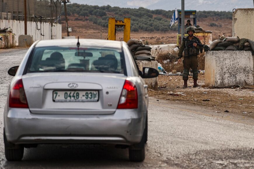 Vehicles often wait long hours in queues at Israeli checkpoints around Nablus