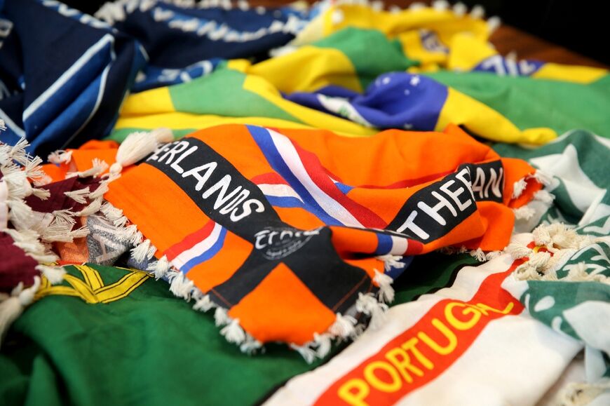 Keffiyah headdress scarves have been made in the national colours of the 32 countries taking part in the World Cup tournament