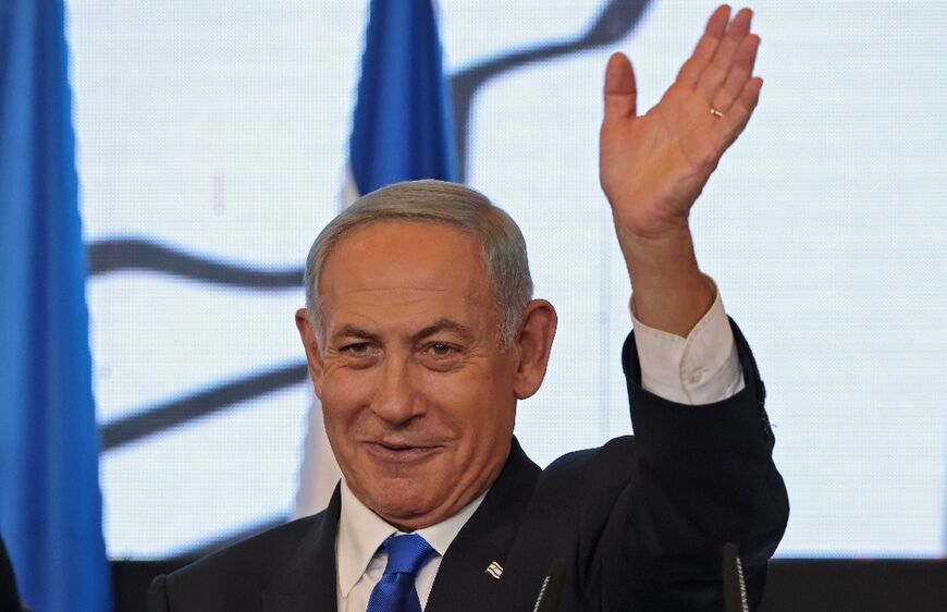 Veteran Israeli leader and head of the Likud party Benjamin Netanyahu addresses supporters at campaign headquarters in Jerusalem early on November 2 after the end of voting for national elections