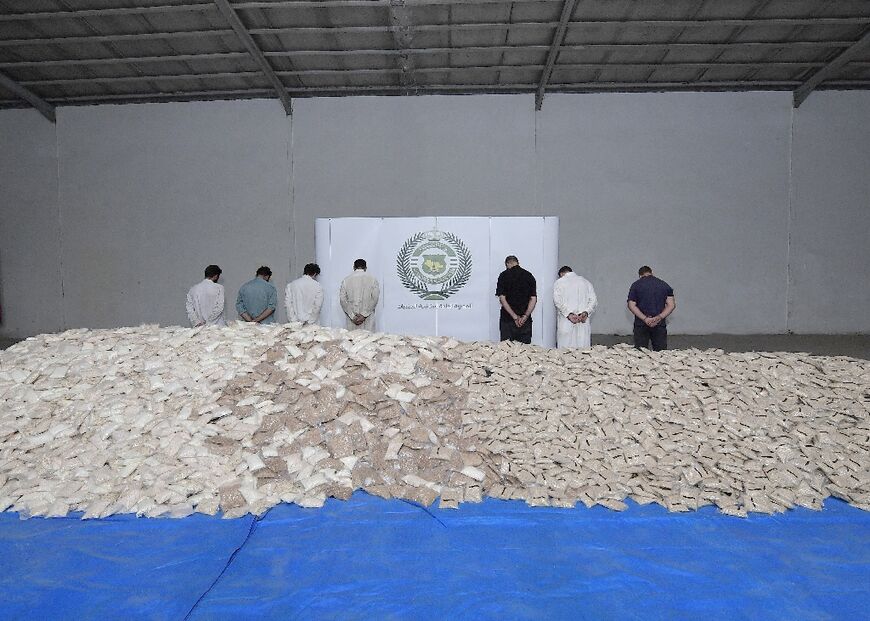 Alleged captagon smugglers who tried to smuggle 47 million pills into Saudi Arabia are paraded before the cameras in Riyadh in August 