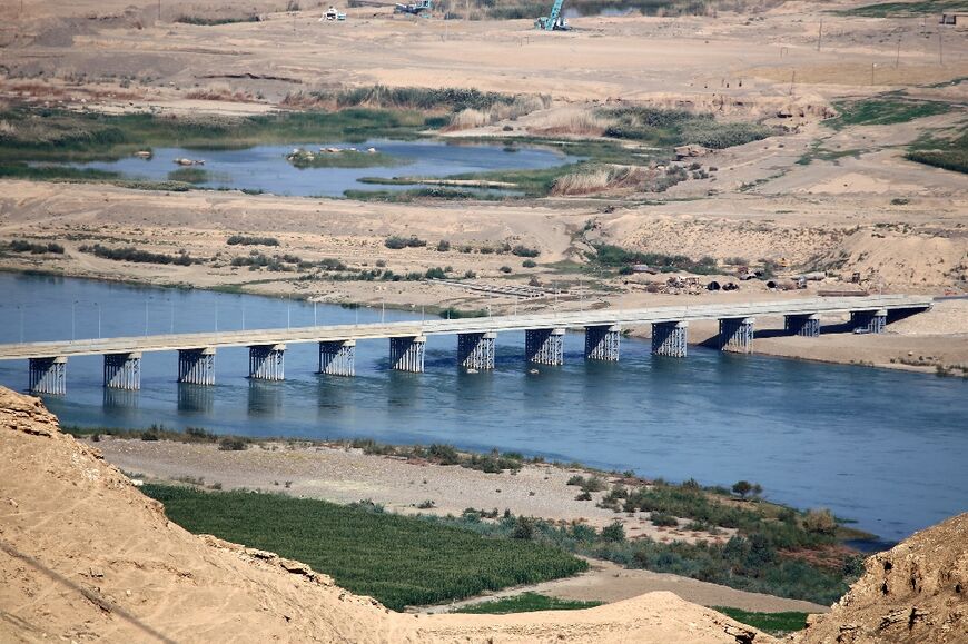 A bridge spans the Tigris river near the Makhoul dam site