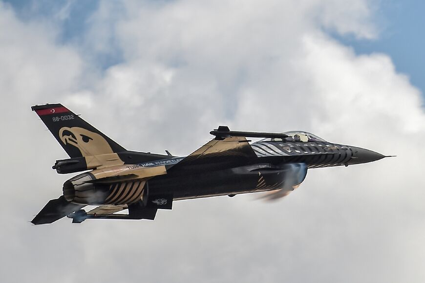A Turkish F-16 fighter is pictured in 2018 flying over Istanbul airport as part an air force display