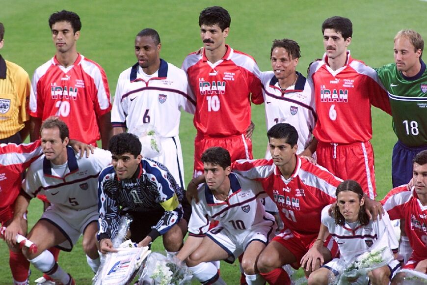 Iran and the United States pose for a joint team photograph before their 1998 World Cup clash
