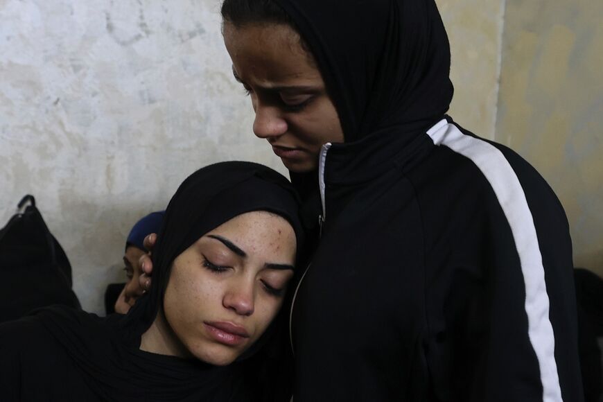 Relatives mourn the death of Palestinian teenager Mahdi Hashash, who died of shrapnel wounds during an Israeli raid
