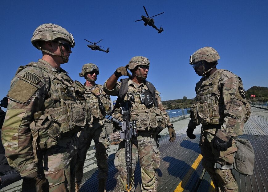 US soldiers participate in a South Korea-US joint military exercise on October 19, 2022. If the US military, the world's biggest by expenditure, were a country, it would have the world's highest per capita emissions