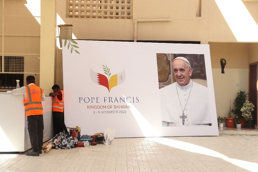 A poster preparing for the visit of Pope Francis: after arriving on Thursday and meeting Bahrain's King Hamad, Pope Francis will hold a mass for about 28,000 people at Bahrain National Stadium on Saturday