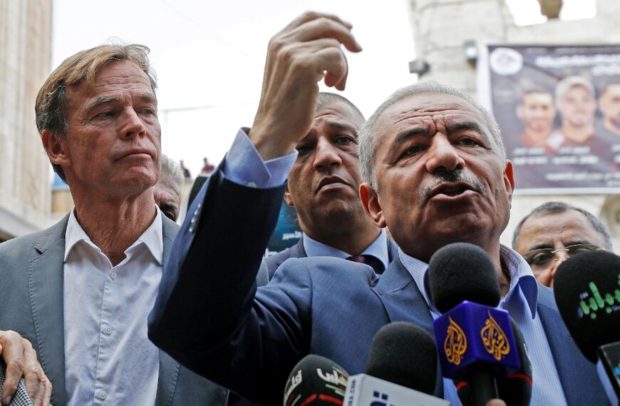 Palestinian prime minister Mohammed Shtayyeh, and Sven Kuhn von Burgsdorff, head of the European Union’s mission to the West Bank and Gaza, speak to reporters in the West Bank city of Nablus on Thursday