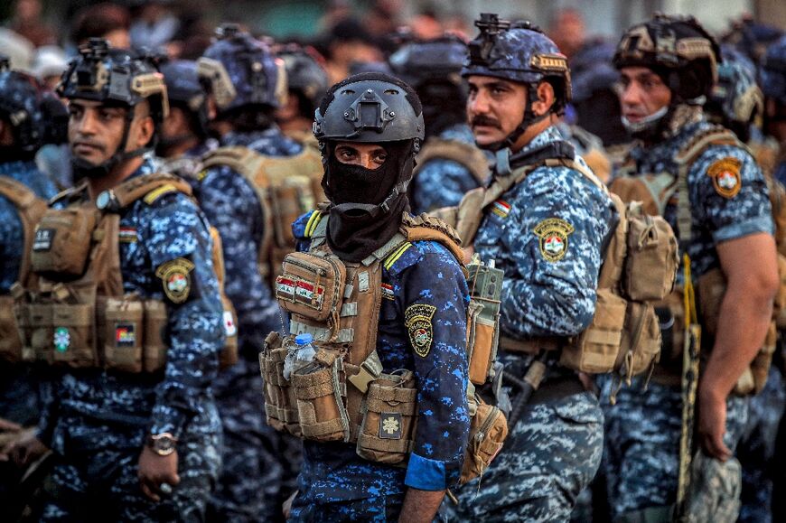 Iraqi security forces, pictured here in Baghdad on October 25, were targeted in an attack in the north of the country in Kirkuk