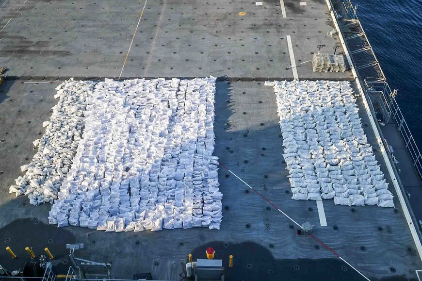 A US handout photograph reportedly shows bags of fuses, rocket propellants and ammunition rounds displayed on the flight deck of the USS Lewis B. Puller
