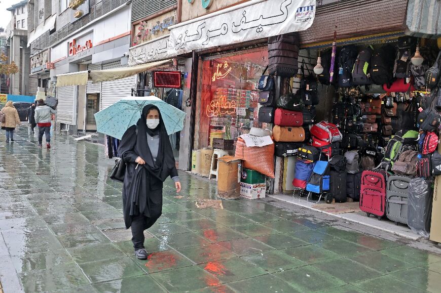 Iran's dress code requires women to cover their heads and to wear long clothes