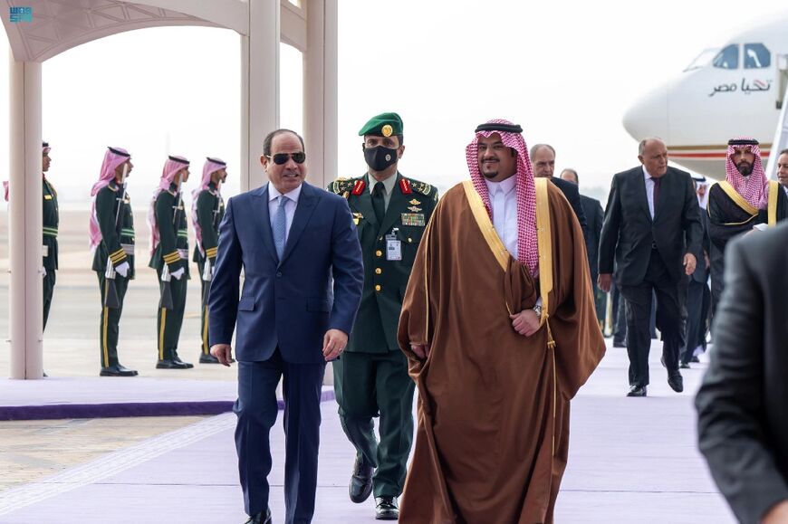 Egyptian President Abdel Fattah al-Sisi, on the left, is welcomed by Saudi Prince Mohammed bin Abdulrahman bin Abdulaziz, Deputy Governor of Riyadh Province, in the capital