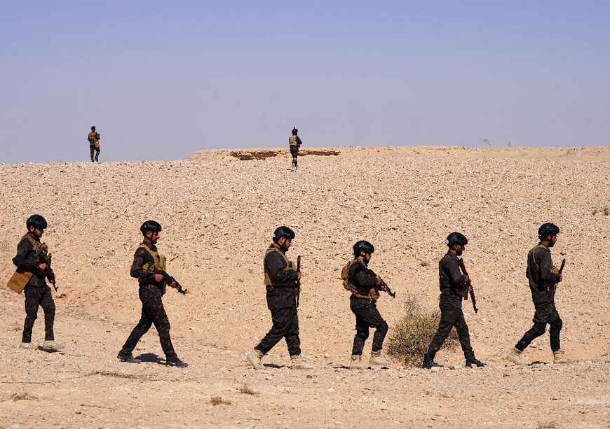 Iran's influence can be seen through its links with Iraq's Hashed al-Shaabi, shown in a security operation near Najaf city 