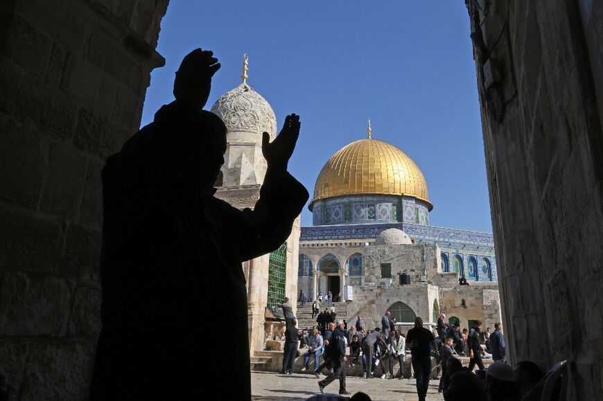 Palestinians gather in the Al-Aqsa mosques compound before the Friday noon prayer in Jerusalem on January 27, 2023