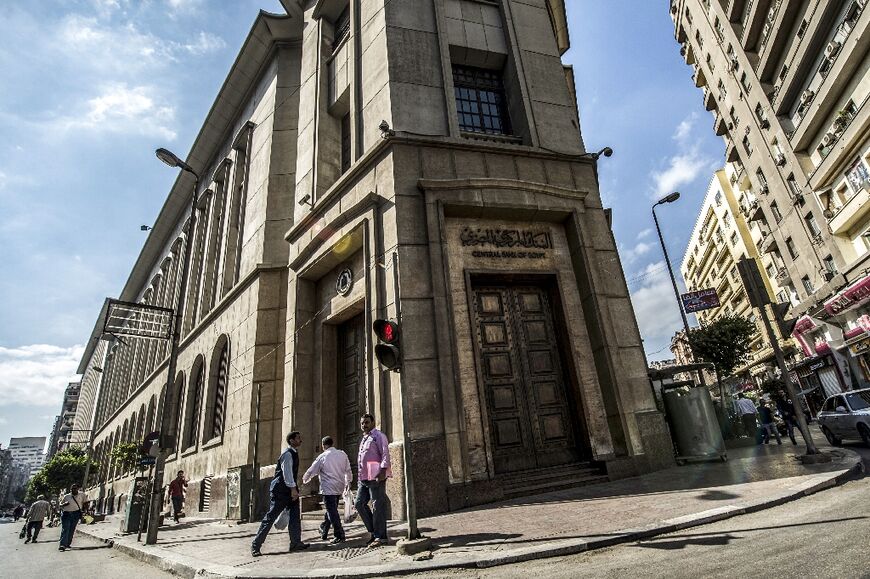 The central bank in downtown Cairo -- Egyptians are again shouldering hardships that come with IMF-backed reforms