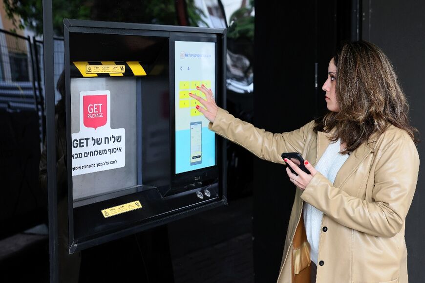 The robot toils in the custom-made space, fitted with a streetside hatch for couriers and shoppers to collect online orders