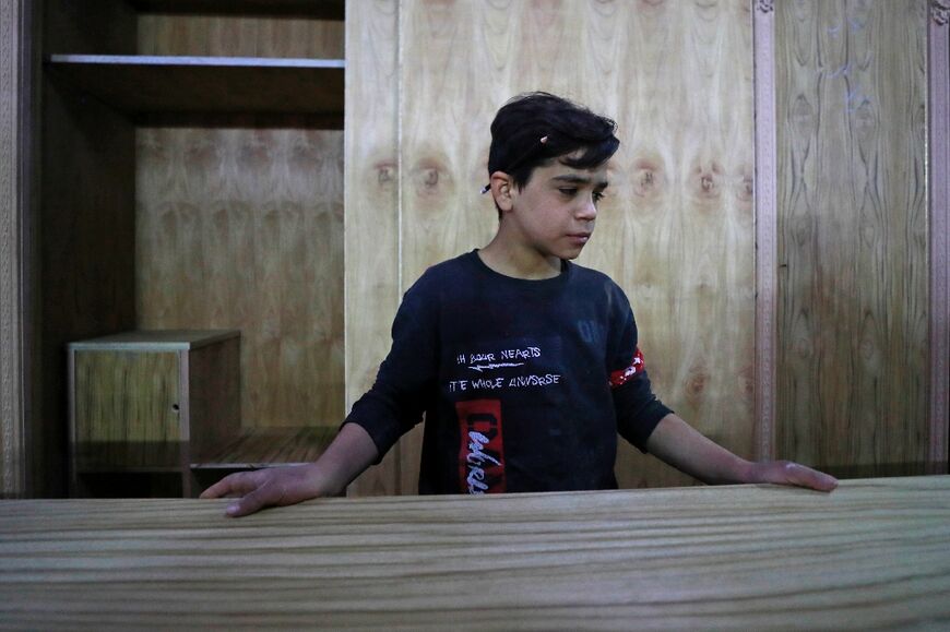 Haydar Karar has been working at his uncle's carpentry shop in Baghdad since age eight