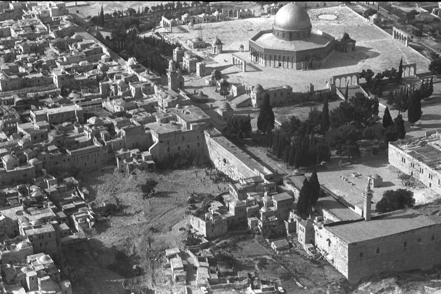 This file Israeli Government Press Office aerial picture taken on June 12, 1967 shows the remaining buildings in the Mughrabi Quarter in Jerusalem's Old City by the Western Wall and the Al-Aqsa mosque compound following the Six Day War