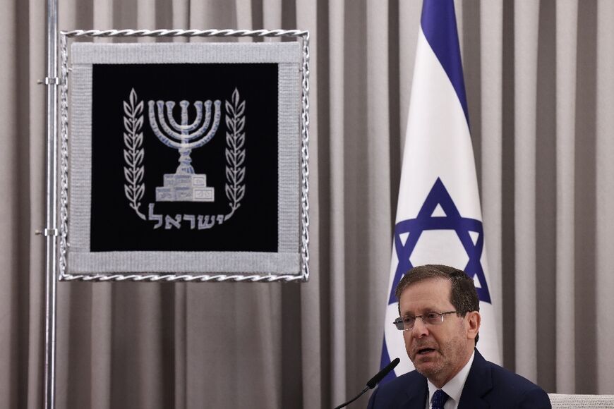 Israeli President Isaac Herzog, pictured here on January 30, 2023, warned that the country is 'on the verge of legal and social collapse'