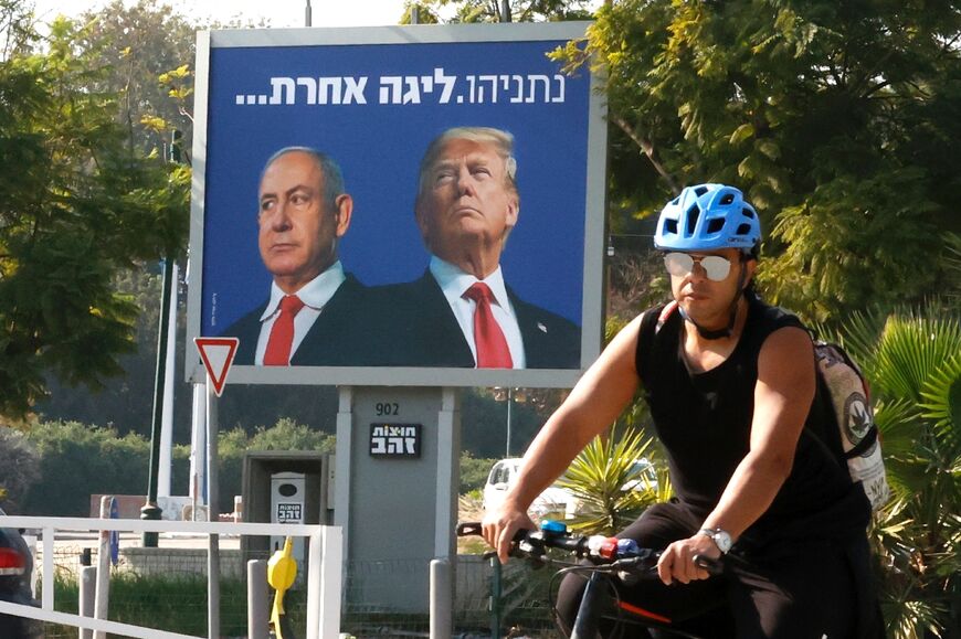 A billboard in Tel Aviv depicts Israel's Prime Minister Benjamin Netanyahu and then US president Donald Trump side by side in January 2021