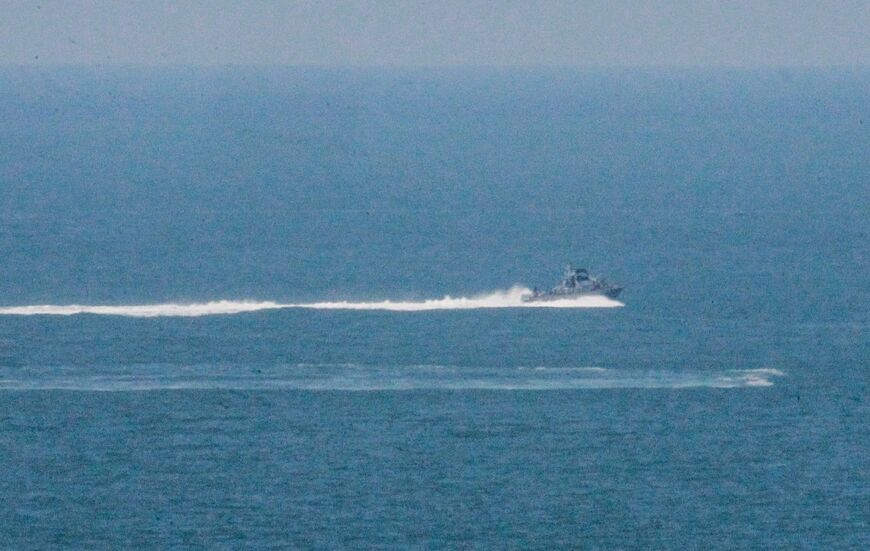 An Israeli naval boat patrols near Gaza City port, under a blockade which Israel says is to prevent militant attacks and arms smuggling 
