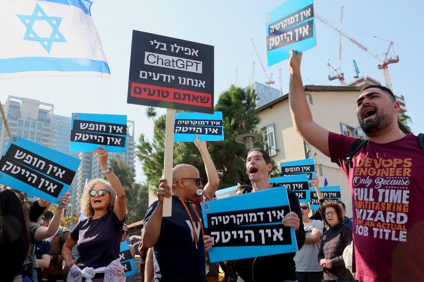 "No democracy, no high-tech," says the slogan on protesters' placards as they rally against reforms, they warn will undermine investor confidence in Israel's legal system and democratic prionciples