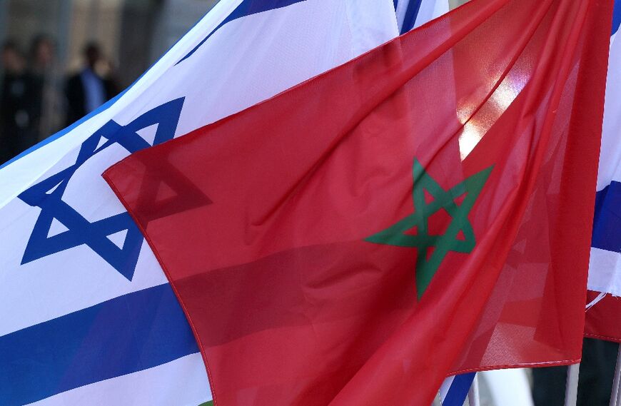 Israeli and Moroccan flags are pictured during an official ceremony in Israel's Mediterranean coastal city of Tel Aviv, on September 13, 2022 